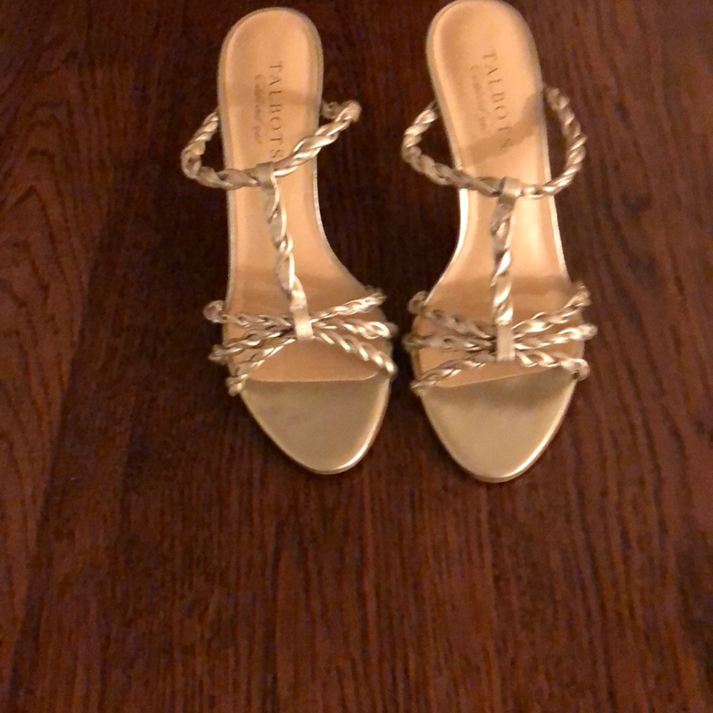 Lovely gold leather high heels.